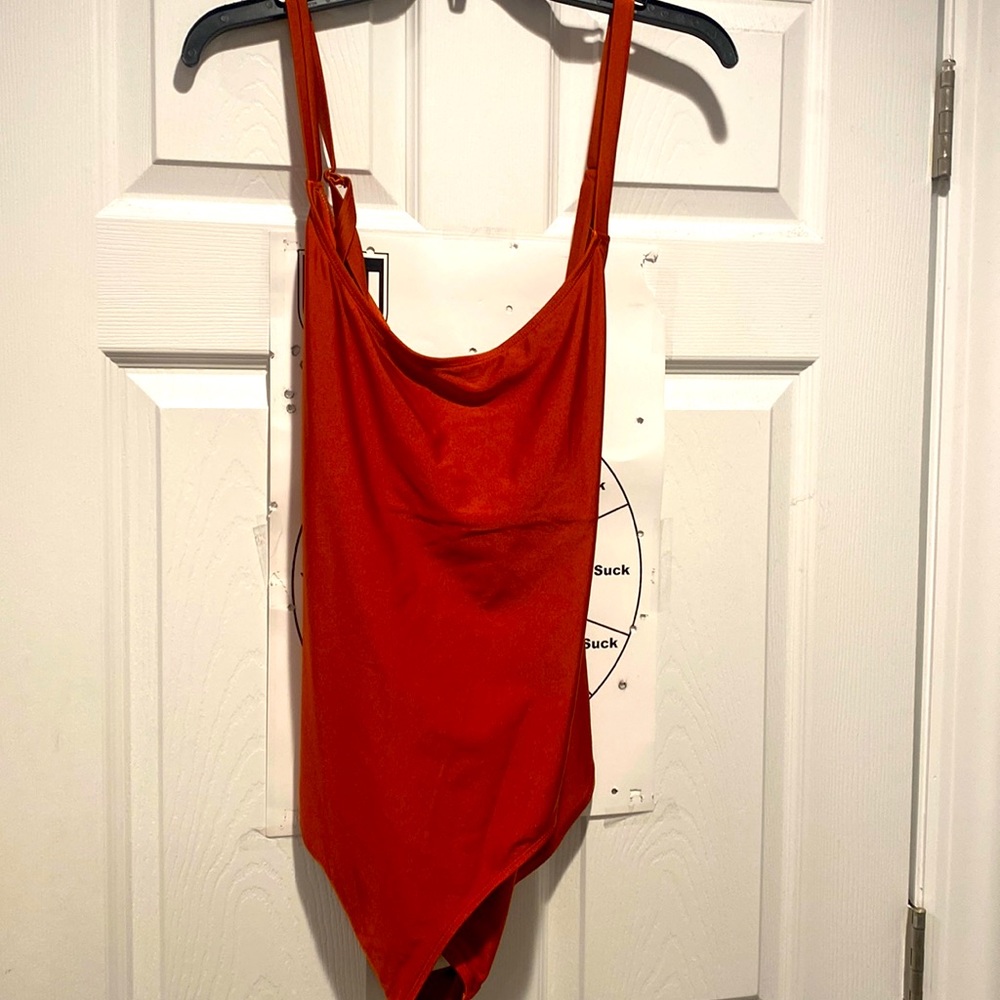 Rustic orange cross back bodysuit